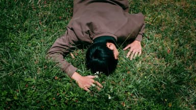 Lying in Grass